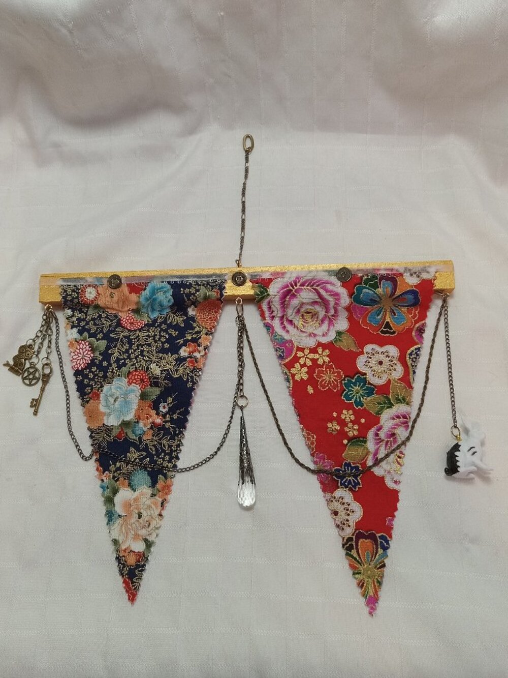 1-A reversible, handmade hanging banner made with fabric, chains, charms & coins